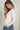 Magasinez le chandail à col en V de Colori - Shop the V-neck top from Colori
