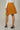 Magasinez la jupe courte plissée de Colori - Shop the mini pleated skirt from Colori