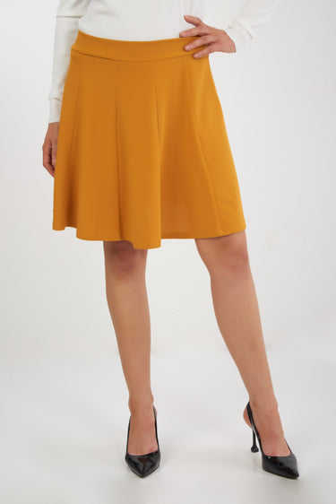 Magasinez la jupe courte plissée de Colori - Shop the mini pleated skirt from Colori