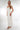 Magasinez la robe élégante à dos ouvert de la nouvelle collection de la Boutique Colori - Shop the elegant dress with open back from new collection from Boutique Colori