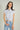 Magasinez la blouse rayée à manches courtes de Colori - Shop the striped short sleeve blouse from Colori