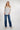 Magasinez la blouse rayée à manches trois-quarts de Colori - Shop the striped three-quarter sleeve blouse from Colori