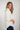 Magasinez la blouse col en V et manches trois-quarts de Colori - Shop the V-neck and three-quarter sleeves blouse from Colori