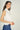 Magasinez la blouse courte sans manches de Colori - Shop the short sleeveless blouse from Colori