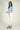 Magasinez la blouse courte en satin de Colori - Shop the short satin blouse from Colori