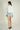 Magasinez la blouse courte à manches longues de Colori - Shop the short blouse with long sleeves from Colori