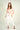Magasinez la blouse courte en satin de Colori - Shop the short satin blouse from Colori
