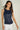 Magasinez la camisole brillante à col rond de Colori - Shop the round-neck shiny camisole de Colori