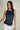 Magasinez la camisole brillante à col rond de Colori - Shop the round-neck shiny camisole de Colori