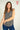 Magasinez la camisole fleurie à demi-fermeture éclair de Colori - Shop the floral half-zip camisole from Colori