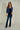 cardigan-court-beige-a-manches-trois-quarts-Colori-short-beige-cardigan-with-three-quarter-sleeves-Colori-pose