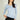 Magasinez le chandail à col en V de Colori - Shop the V-neck sweater from Colori