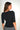 Magasinez le chandail côtelé avec détail en chaîne de Colori - Shop the ribbed sweater with chain detail from Colori