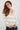 Magasinez le chandail rayé avec col en V de Colori - Shop the striped V-neck from Colori