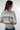 Magasinez le chandail rayé court à col montant de Colori - Shop the short striped turtleneck sweater from Colori