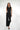 Magasinez la combinaison à haut brillant de Colori - Shop the shiny top jumpsuit from Colori
