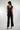 Magasinez la combinaison à haut brillant de Colori - Shop the shiny top jumpsuit from Colori
