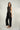 Magasinez la combinaison à haut brillant de Colori - Shop the shiny top jumpsuit from Colori