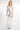 Magasinez la combinaison cache-coeur sans manches de Colori - Shop the sleeveless wrap jumpsuit from Colori