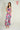 Magasinez la combinaison fleurie en satin de Colori - Shop the floral satin jumpsuit from Colori