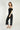 Magasinez la combinaison à épaules dénudées de Colori - Shop the off-the-shoulder jumpsuit from Colori