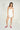 Magasinez le combishort à fines bretelles de Colori - Shop the romper with thin straps from Colori