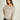 Magasinez le haut rayé à manches chauve-souris de Colori - Shop the striped top with batwing sleeves from Colori
