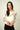 Magasinez le haut pour femme fleuri à manches trois-quarts de Colori - Shop the floral top with three-quarter sleeves from Colori