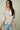 Magasinez le haut pour femme fleuri à manches trois-quarts de Colori - Shop the floral top with three-quarter sleeves from Colori