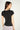 Magasinez le haut côtelé à manches courtes de Colori - Shop the ribbed short sleeve top from Colori