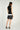 Magasinez le haut sans manches à col cravate de Colori - Shop the sleeveless tie neck top from Colori