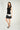 Magasinez le haut sans manches à col cravate de Colori - Shop the sleeveless tie neck top from Colori
