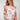 Magasinez le haut en filet fleuri à manches trois-quarts de Colori - Shop the floral mesh top with three-quarter sleeves from Colori