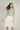 Magasinez la jupe courte évasée de Colori - Shop the short flared skirt from Colori