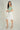 Magasinez la jupe courte évasée de Colori - Shop the short flared skirt from Colori