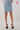 Magasinez la jupe courte à coupe droite de Colori - Shop the straight-cut mini skirt from Colori