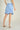 Magasinez la jupe courte évasée de Colori - Shop the short flared skirt from Colori