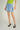 Magasinez la jupe courte en denim de Colori - Shop the short denim skirt from Colori
