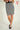Magasinez la jupe courte en tissu bouclé de Colori - Shop the bouclé fabric short skirt from Colori