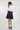 Magasinez la jupe courte plissée de Colori - Shop the mini pleated skirt from Colori