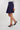 Magasinez la jupe courte plissée de Colori - Shop the mini pleated skirt from Colori