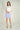 Magasinez la jupe courte droite de Colori - Shop the short straight skirt from Colori