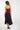 Magasinez la jupe midi asymétrique de Colori - Shop the symmetrical midi skirt from Colori