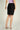 Magasinez la jupe courte droite de Colori - Shop the short straight skirt from Colori
