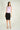 Magasinez la jupe courte droite de Colori - Shop the short straight skirt from Colori