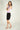 Magasinez la jupe courte droite de Colori - Shop the short straight skirt from Colori
