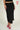 Magasinez la jupe portefeuille brillante de Colori - Shop the shiny wrap skirt from Colori