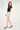 Magasinez la jupe courte à texture bouclée de Colori - Shop the short skirt with bouclé texture from Colori