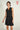 Magasinez la robe à pois sans manches de Colori - Shop the sleeveless polka dot dress from Colori