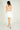 Magasinez la robe courte à volants de Colori - Shop the short ruffled dress from Colori